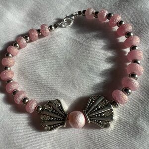 Elegant Pink Pearlescent Beaded Bracelet with Silver Accents